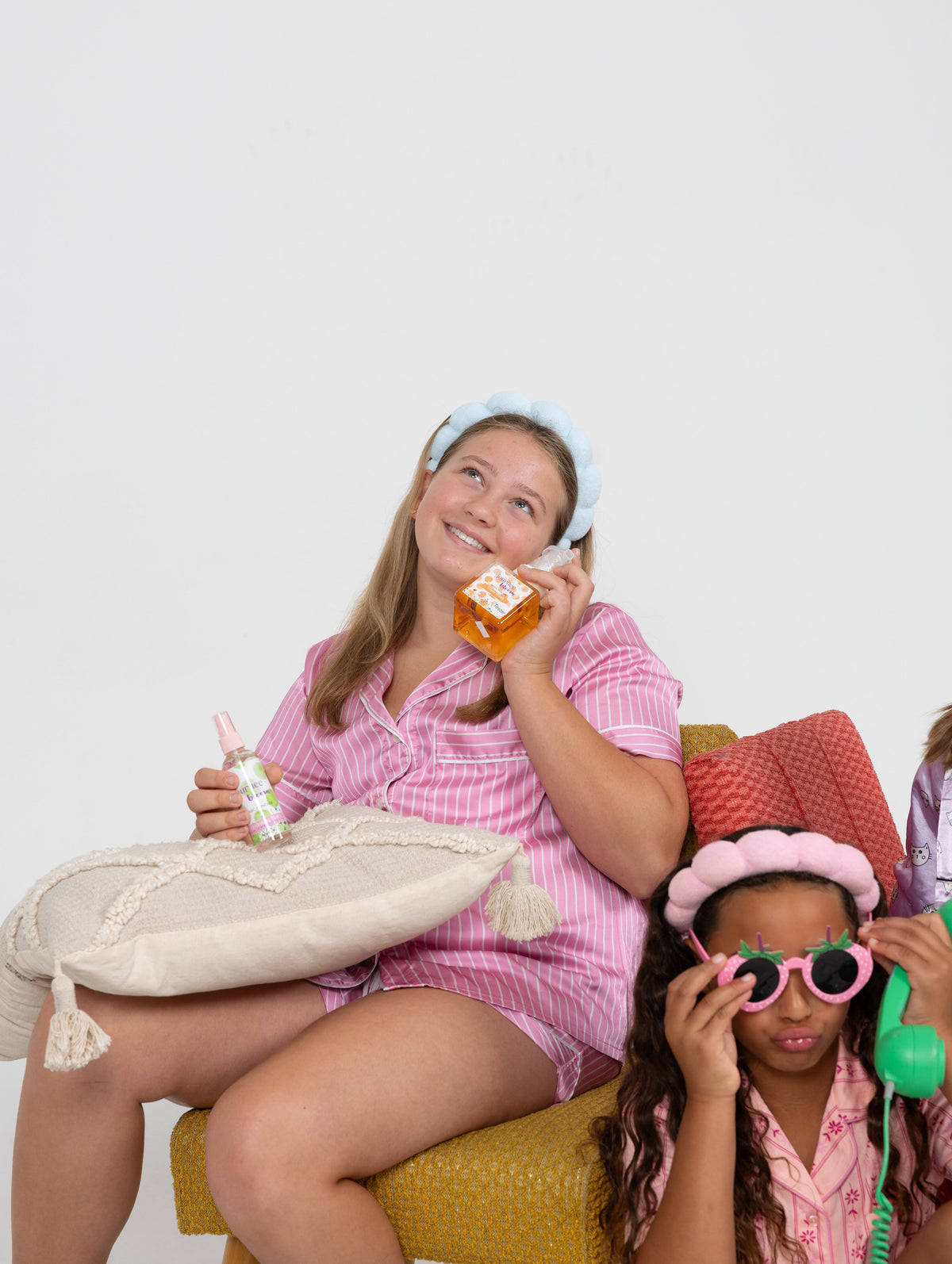 Tween girl in pajamas with her face wash at bedtime